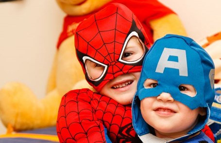Kids wearing superhero costumes - photo by Steven Libralon